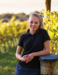 GSP student Jessica Clarke poses in vineyard