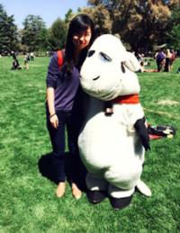 GSP student Xi Wang poses with cow