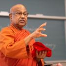 visiting buddhist monk presents at a religious studies class